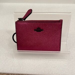 COACH Pebbled Leather Zip Card Case in Berry keychain wallet